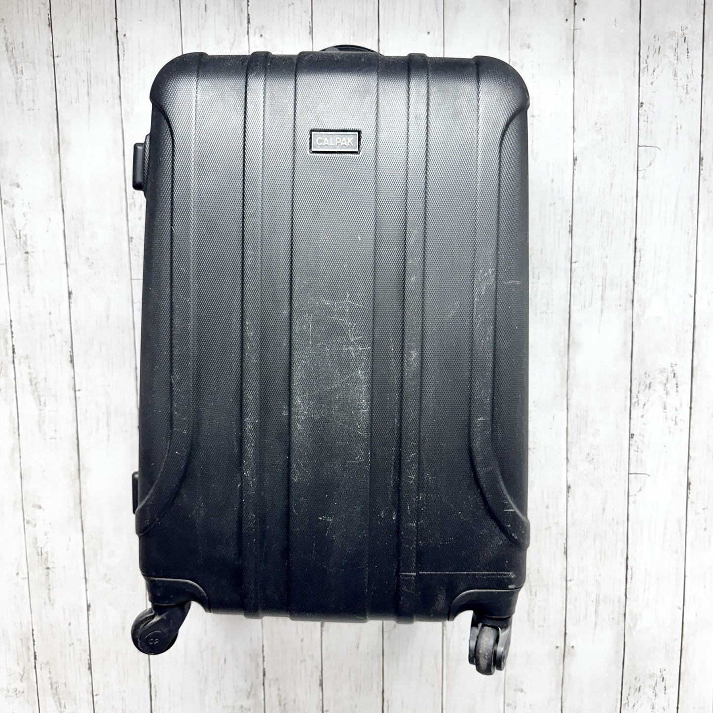 Calpak Luggage Medium Size Black Hard Expandable 360-Spinner Suitcase Travel
